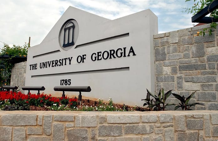 A sign for the University of Georgia is seen, May 28, 2004, in Athens, Ga. A woman was found dead Thursday, Feb. 22, 2024, on the campus of the University of Georgia after a friend told police she had not returned from a morning run, the university said. Allen Sullivan/AP