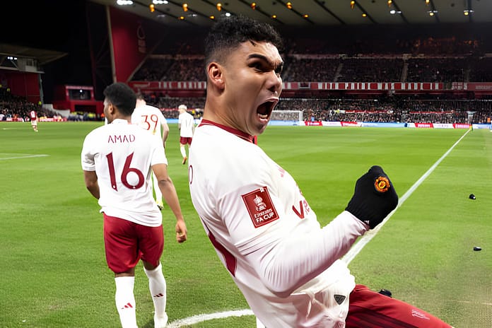 NOTTINGHAM, ENGLAND - FEBRUARY 28: Casemiro of Manchester United celebrates after scoring a goal to make it 0-1 during the Emirates FA Cup Fifth Round match between Nottingham Forest and Manchester United at City Ground on February 28, 2024 in Nottingham, England. (Photo by Robbie Jay Barratt - AMA/Getty Images)